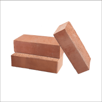 three red bricks on a black background